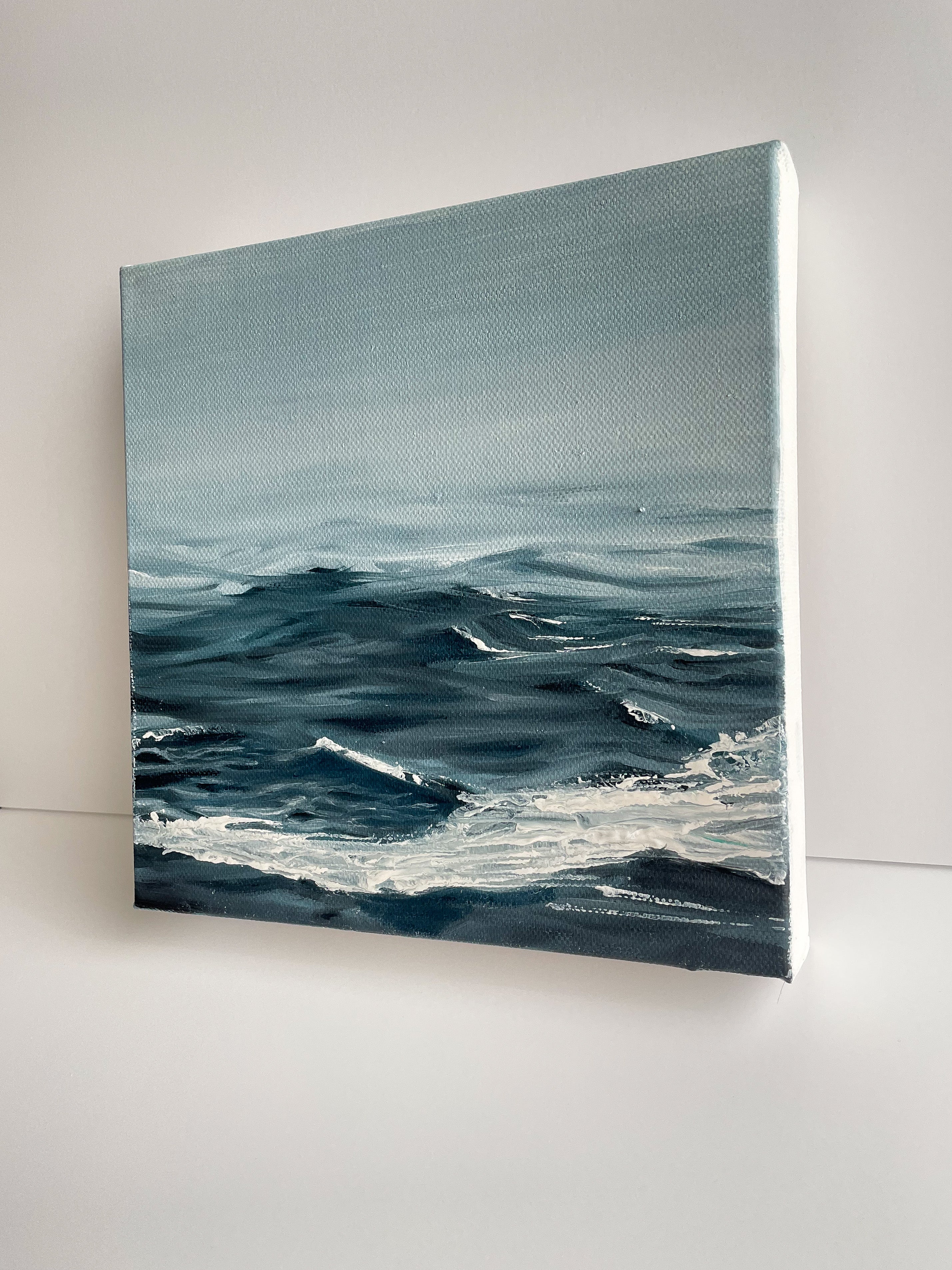 Abstract stormy seascape in coastal wall art, symbolising hope, perfect beach wall art for beach house artwork. Side
