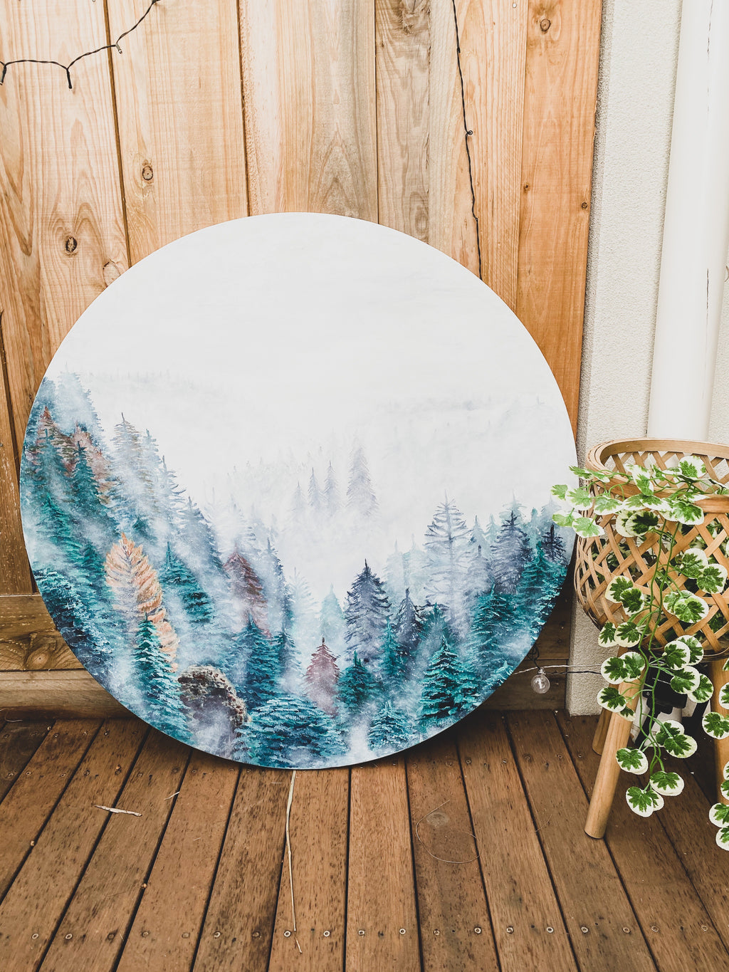 White fog and cold autumn pines transport you to the misty forests of Canada. This round artwork by an authentic Australian artist, offers calmness and coziness. Ready to hang artwork suitable for any interior. Buy fine art online with Afterpay and enjoy interest-free payments. Perfect for office art. Online paintings for sale. Size: 90cm 